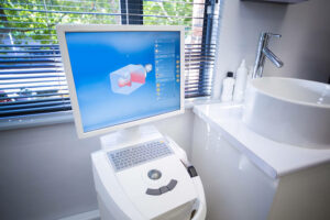 a close-up of an iTero intraoral scanner in a dental clinic